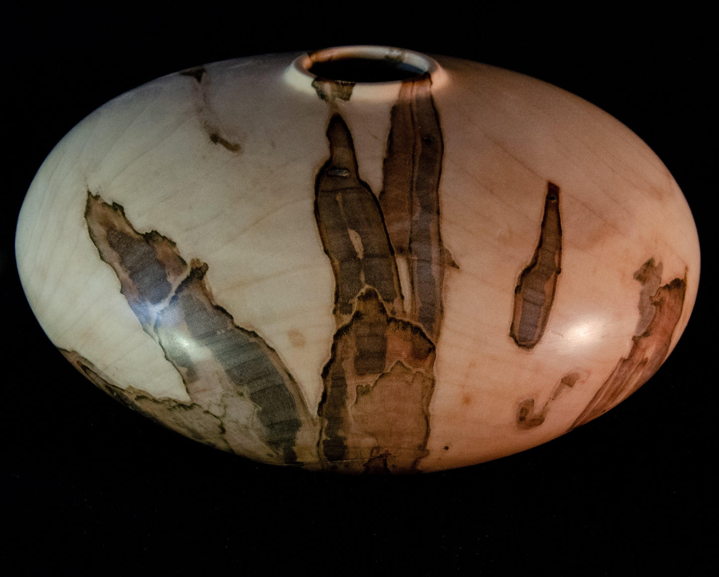 Lozenge-shaped closed vessel made of maple with striking coloration. Lozenge-shaped closed vessel made of maple with striking coloration. Beautiful unique handmade gift idea for home or wedding
