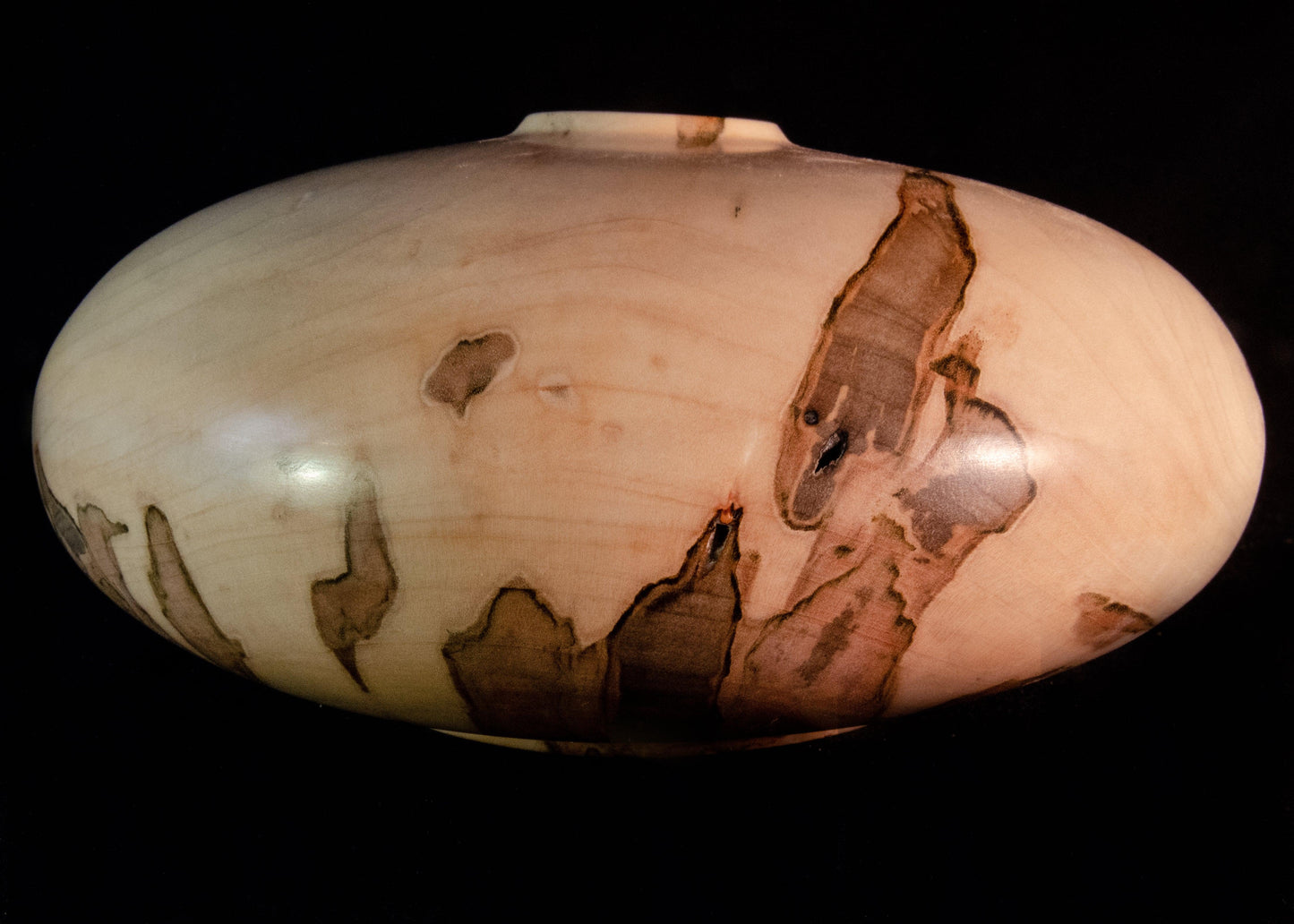 Lozenge-shaped closed vessel made of maple with striking coloration. Lozenge-shaped closed vessel made of maple with striking coloration. Beautiful unique handmade gift idea for home or wedding