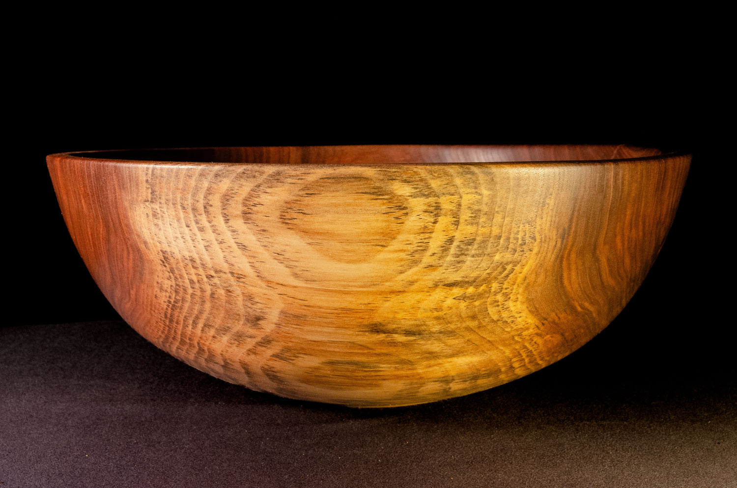 Black walnut bowl with rich grain structure and tonality. Crack on one side mended with bowties. Beautiful sald, fruit or popcorn bowl. Makes a wonderful gift for home, wedding, or occasion.