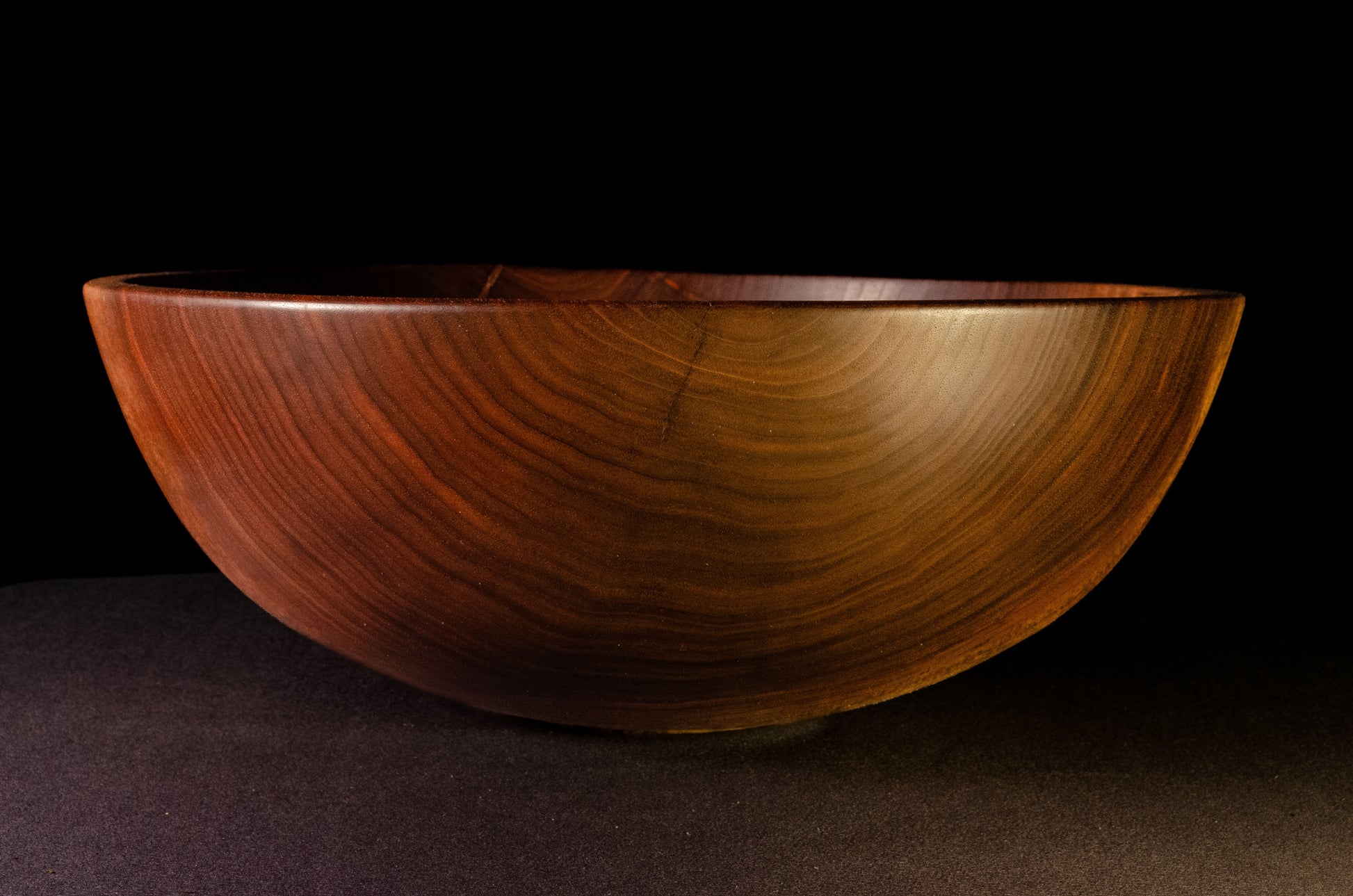 Black walnut bowl with rich grain structure and tonality. Crack on one side mended with bowties. Beautiful sald, fruit or popcorn bowl. Makes a wonderful gift for home, wedding, or occasion.