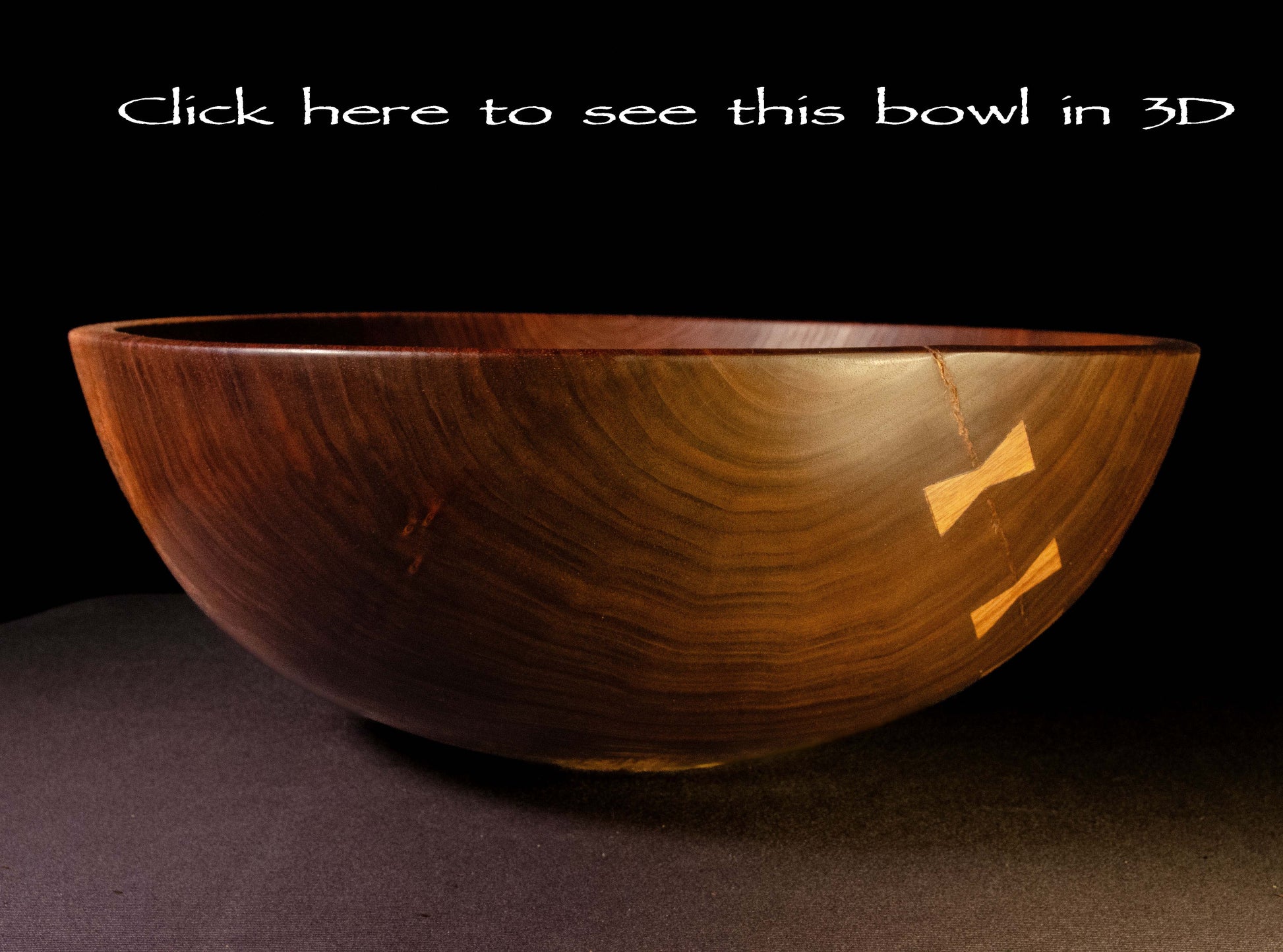 Black walnut bowl with rich grain structure and tonality. Crack on one side mended with bowties. Beautiful sald, fruit or popcorn bowl. Makes a wonderful gift for home, wedding, or occasion.