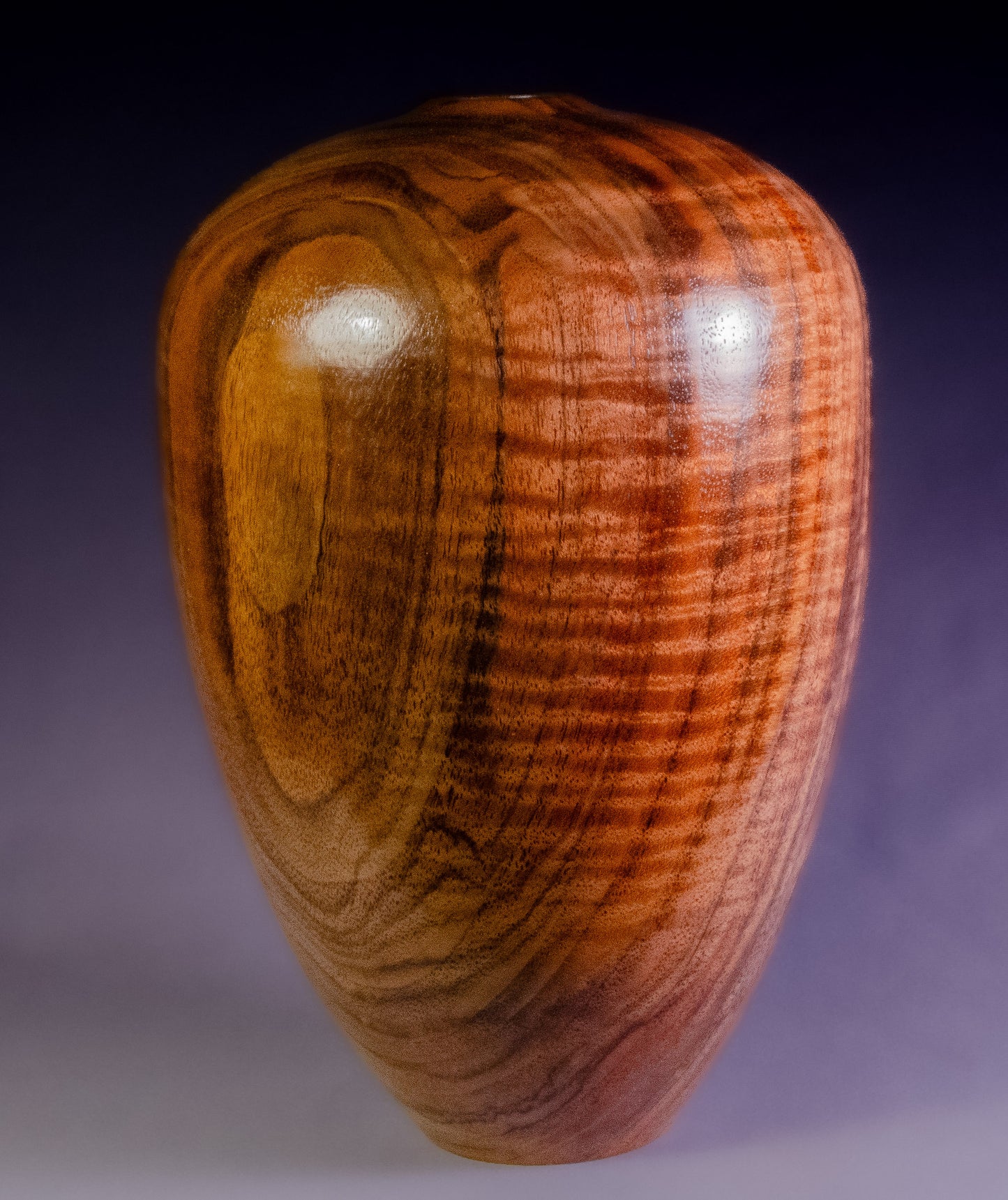 Curly black walnut hollow form