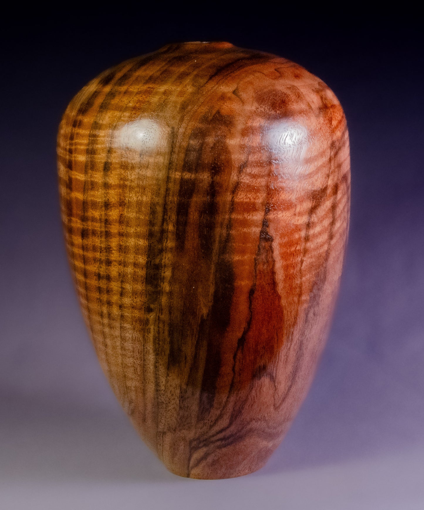 Curly black walnut hollow form