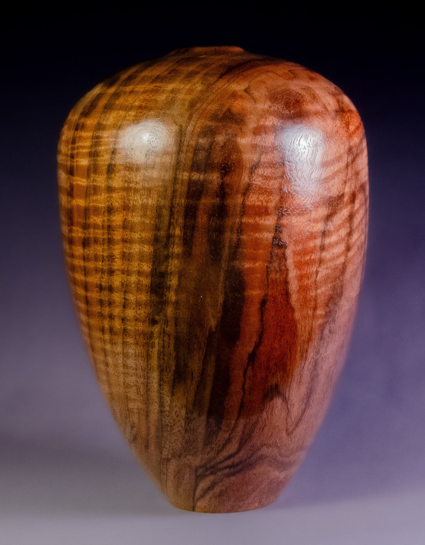 Curly black walnut hollow form
