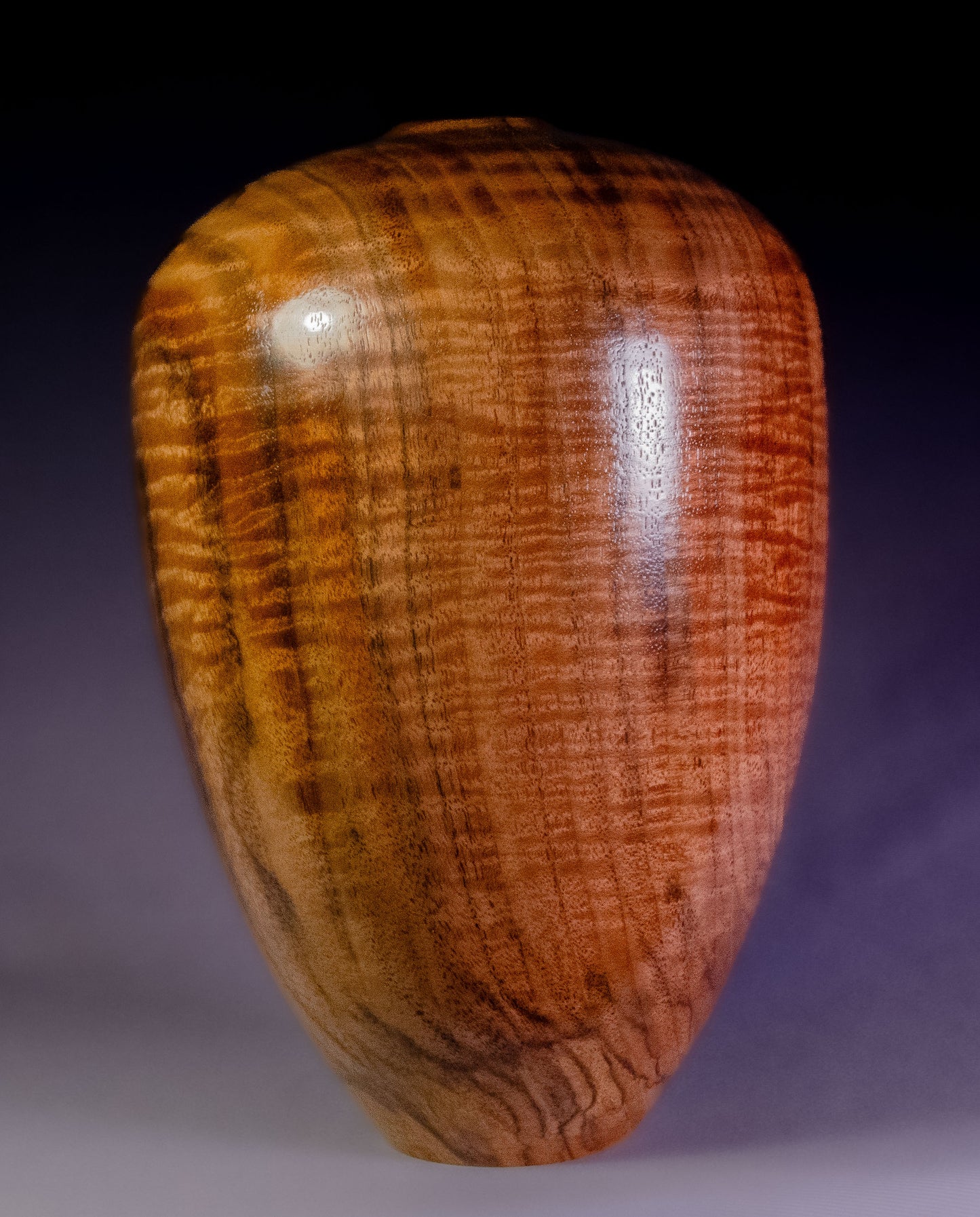Curly black walnut hollow form