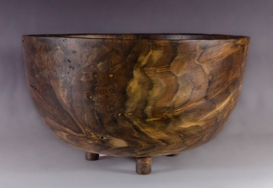 Claro Walnut bowl with carved feet