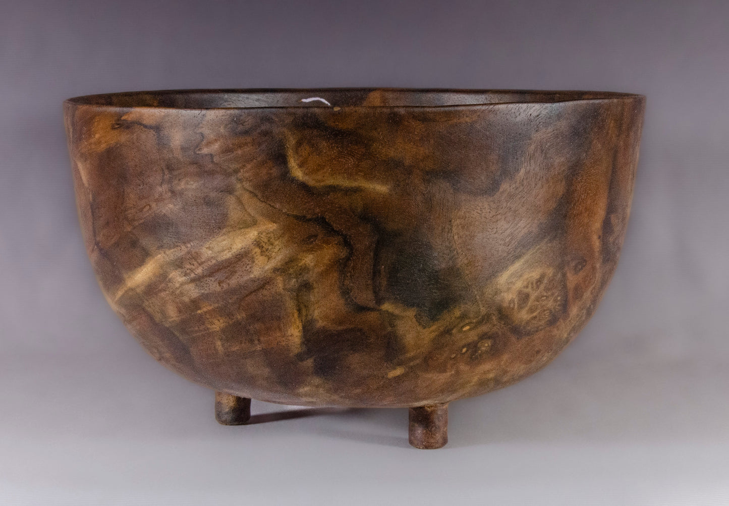 Claro Walnut bowl with carved feet