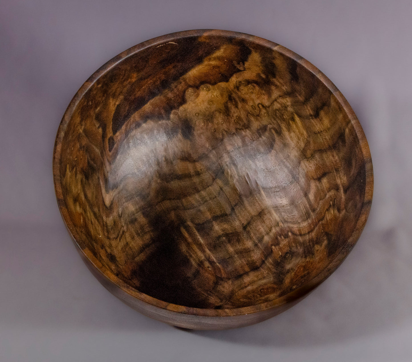 Claro Walnut bowl with carved feet