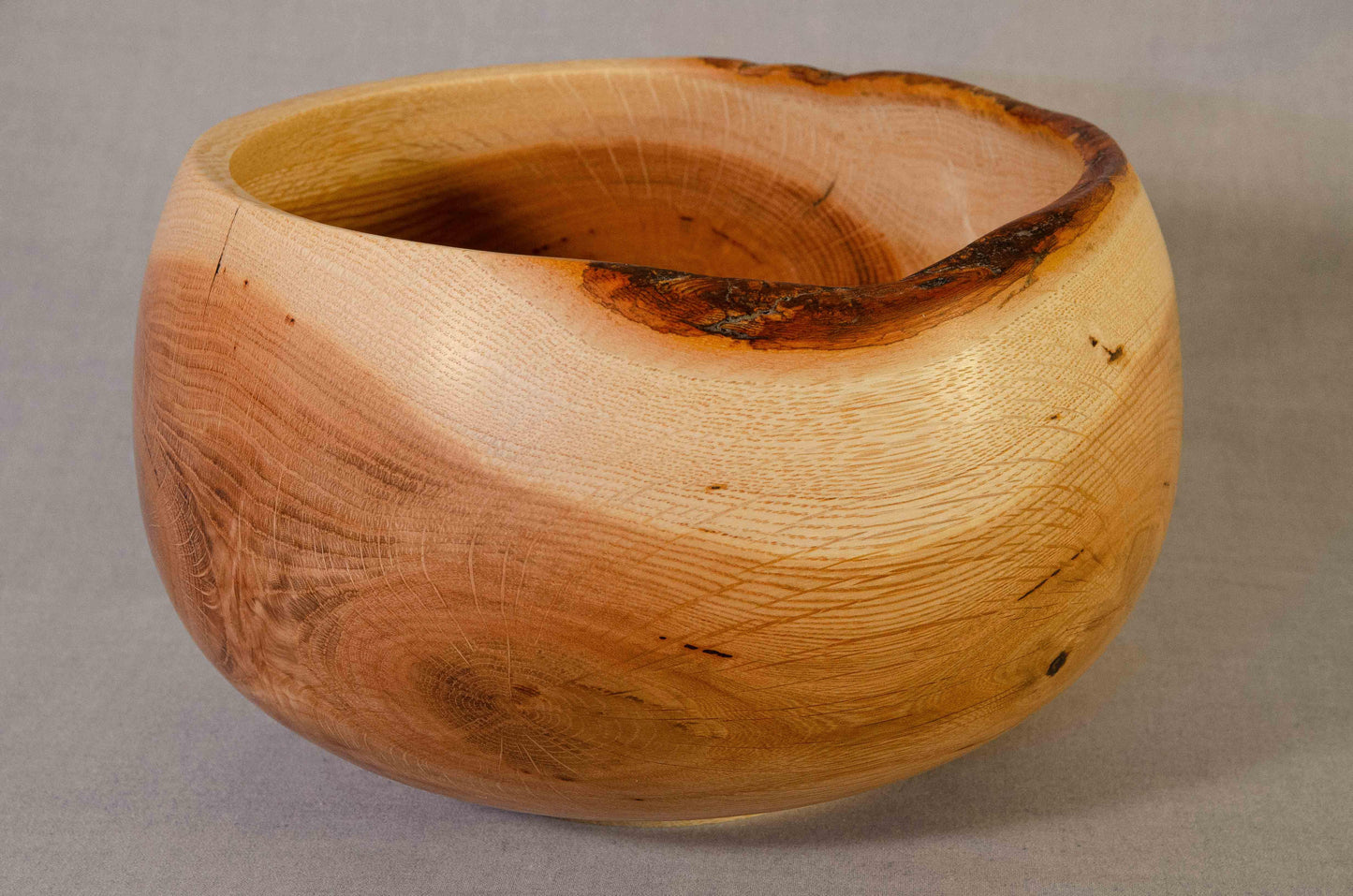 Large oak bowl with partial natural edge