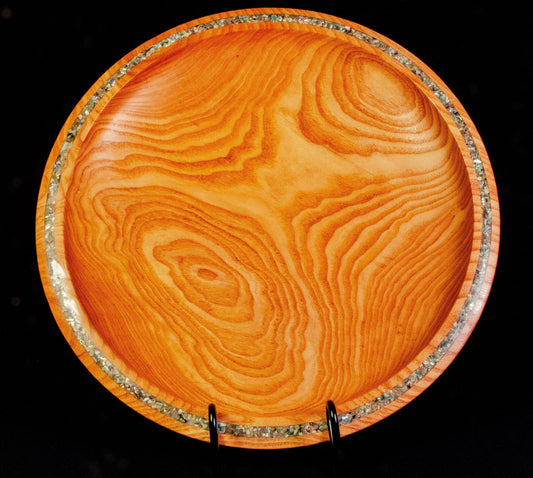 Honey Locust Platter. Dramatic edge feature with abalone shell adds sparkle to a strongly figured platter.