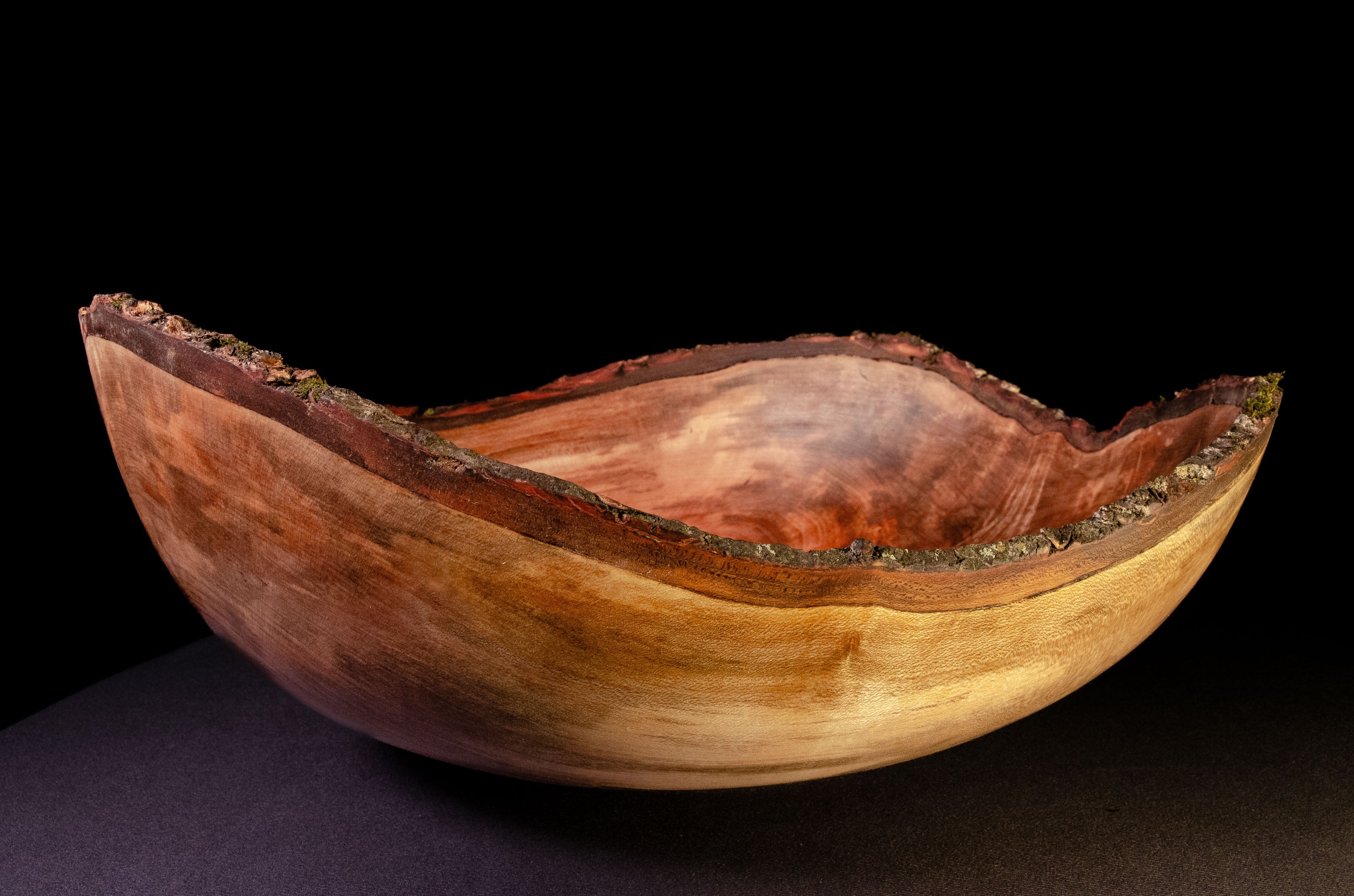 Shallow bowl with natural edge and striking crotch figure. Exquisite display, gift, or centerpiece.